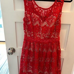 Red lace dress with nude lining by Soieblu. Size S